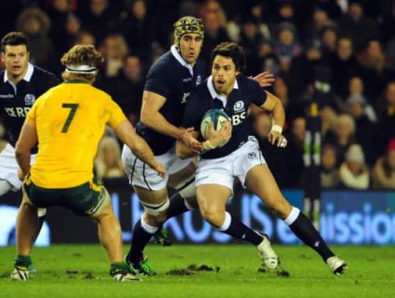 Scotland full-back Sean Maitland tries to find a way past Australian openside flanker, Michael Hooper, supported by skipper Kelly Brown. Picture: Ian Rutherford