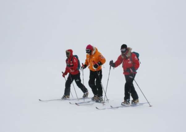 Prince Harry (right) and his fellow trekkers in skiing training ahead of their journey. Picture: PA