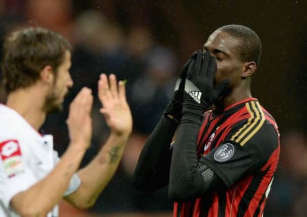 A dejected Mario Balotelli during his side's game with Genoa last night. Picture: Getty