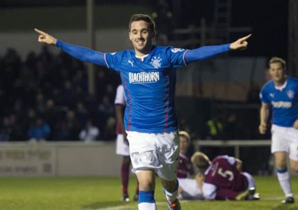 Nicky Clark celebrates after heading home Rangers' third goal of the game. Picture: SNS