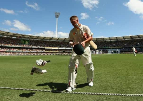 David Warner of Australia walks off the field after being dismissed by Stuart Broad. Picture: Getty