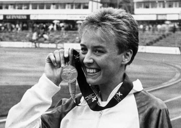 Liz McColgan with her gold medal after winning the 10,000m at the 1986 Commonwealth Games. Picture: Crauford Tait