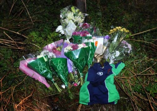Floral tributes left near the scene of the accident in Tyninghame, East Lothian. Picture: Jane Barlow