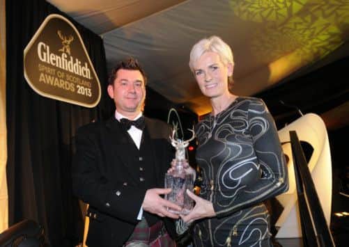 Andy Murrays mother Judy picked up the award on his behalf. Picture: Greg  Macvean