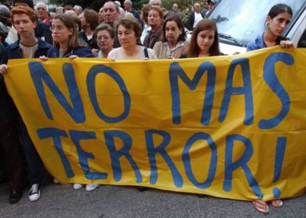 Banners like this could soon become a crime in Spain under a new law outlawing 'offensive' slogans. Picture: AP