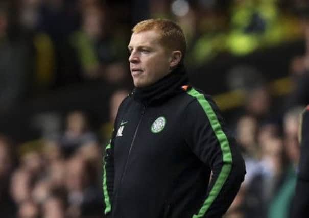 Neil Lennon watched his Celtic side crash out of Europe after a 3-0 defeat at the hands of AC Milan. Picture: AP