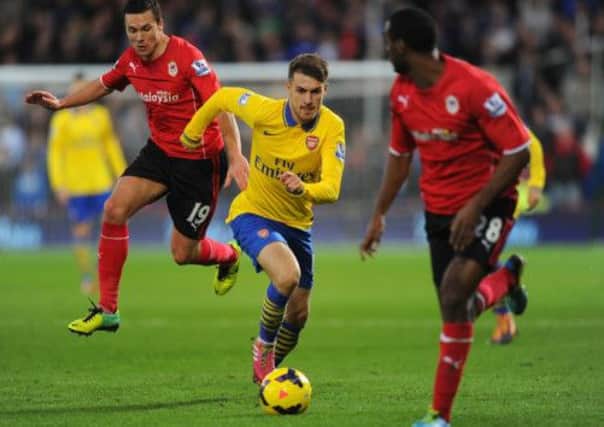 Welsh wizard: Arsenals Aaron Ramsey steals the show against Cardiff. Picture: Getty