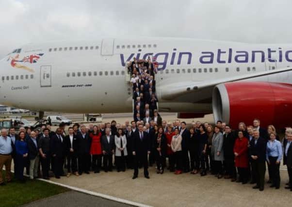 Britains trade delegation to China prepares to leave Heathrow. Picture: PA
