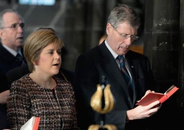 Deputy First Minister Nicola Sturgeon and Justice secretary Kenny MacAskill at the memorial service. Picture: Getty