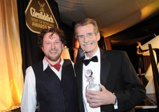William McIlvanney (right) picked up the writing prize at the Spirit of Scotland Awards. Picture: Greg Macvean