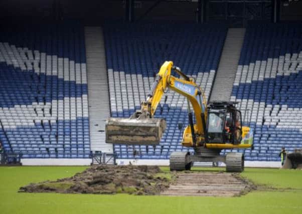 The Hampden turf is being dug up in preparation for the 2014 Commonwealth Games. Picture: PA