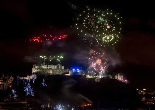 Fireworks from Edinburgh Castle - one of the key moments in your Edinburgh Hogmanay experience. Picture: TSPL