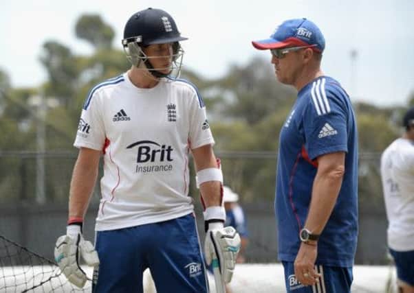 Joe Root speaks with coach Andy Flower during an England nets session at the Adelaide Oval. Picture: Getty