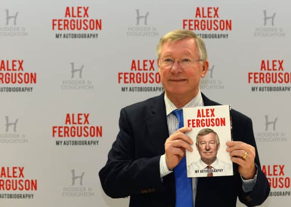Former Manchester United manager Sir Alex Ferguson with his new book "My Autobiography". Picture: Getty