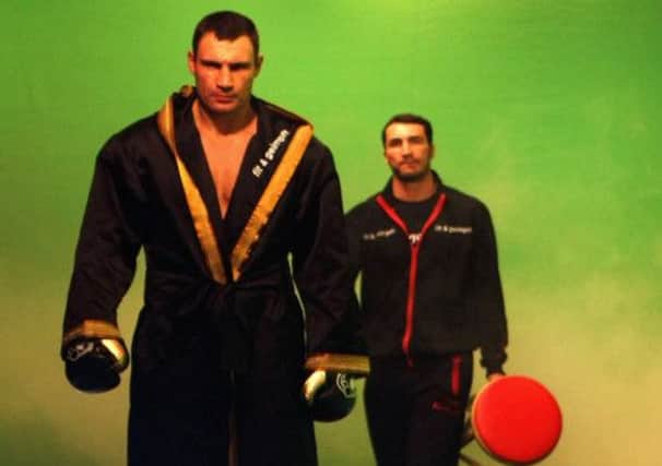 Vitaly, left, and Vladimir Klitschko  the boxer is seen as a thoughtful challenger for Ukraines presidency. Picture: Getty