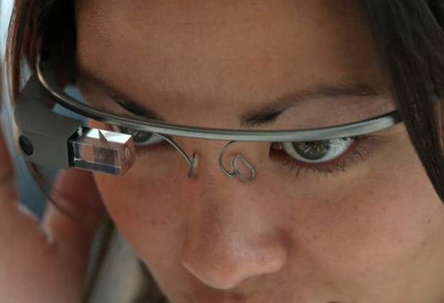 Google Glass will allow users to access projected information as they view the world around them. Picture: Getty
