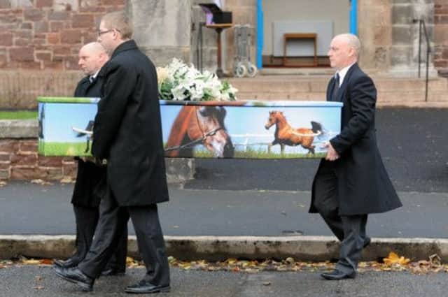 Jenna Barbours coffin was painted with pictures of the animals she adored. Picture: Neil Hanna