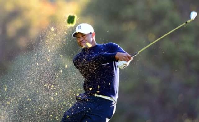 Tournament host Tiger Woods plays a shot on the 18th during the Northwestern Mutual Challenge. Picture: AFP/Getty Images