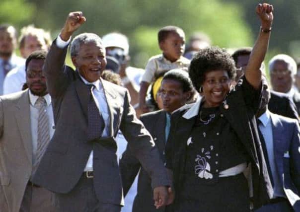 Nelson Mandela accompanied by his wife Winnie, walks out of the Victor Verster prison, near Cape Town, on 11 February 1990. Picture: Reuters