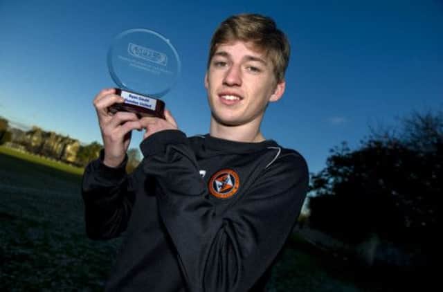 Ryan Gauld with his Premiership young player of the month award for November. Picture: SNS