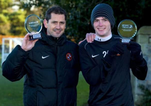 Dundee United pair Jackie McNamara and Andrew Robertson show off their Manager and Player of Month Awards. Picture: SNS