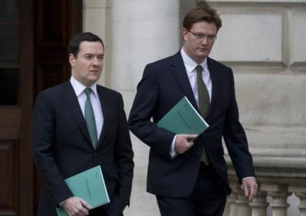 Danny Alexander (r) said that the SNP has been boosted by the Autumn Statement. Picture: Getty