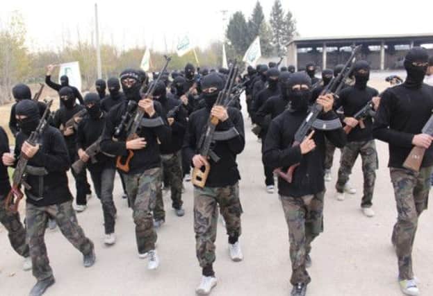 Islamist rebels, such as these in training near Damascus are flocking to join Isis in the field. Picture: Reuters