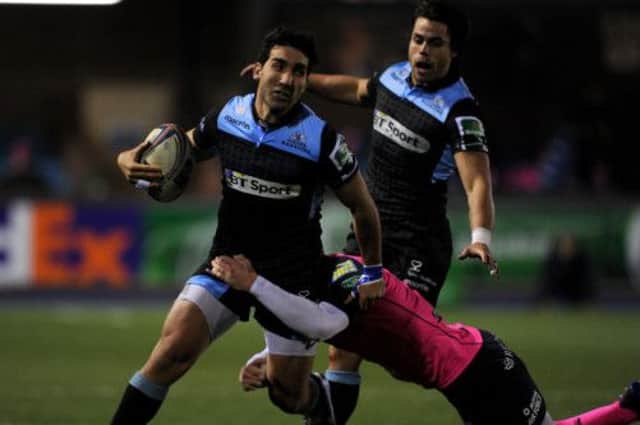 Glasgow's Gabriel Ascarate is tackled during the Heineken Cup match. Picture: PA