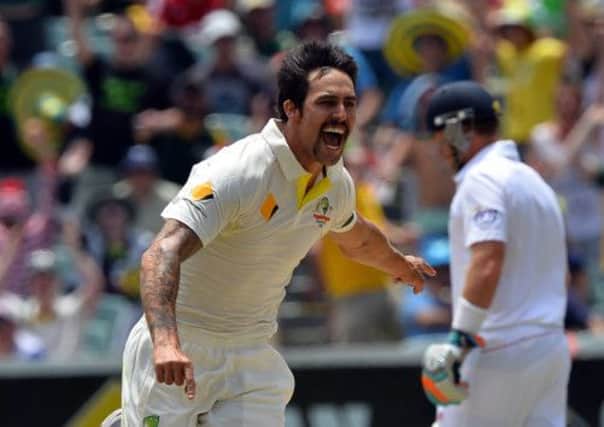 England's tormentor-in-chief, left-arm fast bowler Mitchell Johnson, celebrates after taking the wicket of Matt Prior at the Adelaide Oval. Picture: Getty