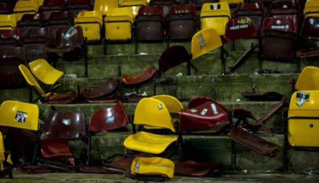Damaged seats in the South Stand. Picture: SNS
