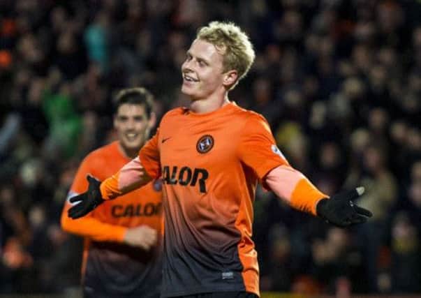 Gary Mackay-Steven celebrates his goal for free-scoring Dundee United. Picture: SNS
