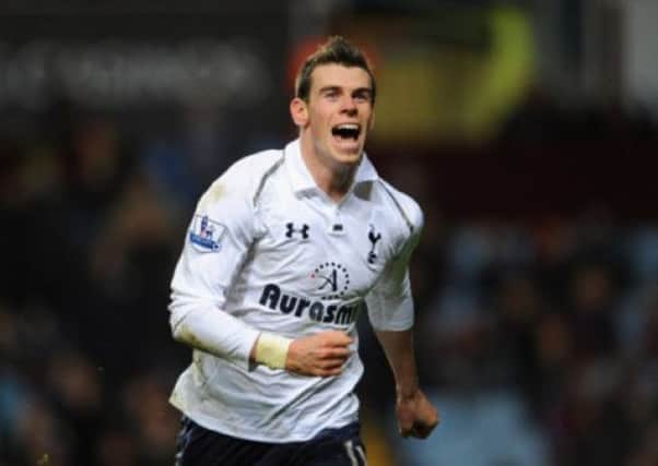Gareth Bale's goal celebration logo has now been trade marked, one way of controlling use of his image. Picture: Getty