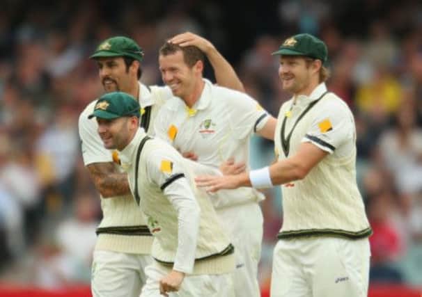 Australia celebrate the key wicket of Matt Prior off the bowling of Peter Siddle (centre). Picture: Getty