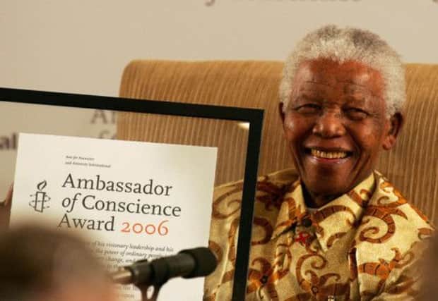 Mandela fought for the dignity and rights of people living with HIV. Picture: AFP/Getty