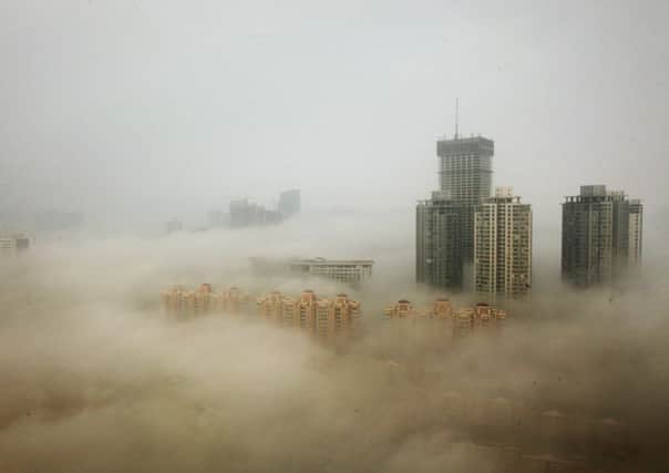 The city of Lianyungang, Jiangsu province, shrouded in smog this week. Picture: Getty