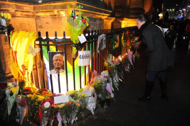 A vigil was held in Glasgow last week, highlighting the citys support of Nelson Mandela. Picture: Robert Perry