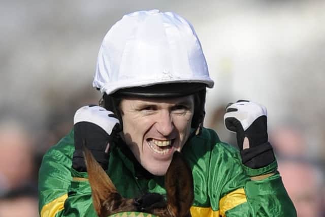 Tony McCoy celebrates on Binocular in the Champion Hurdle, 2010. Picture: Getty