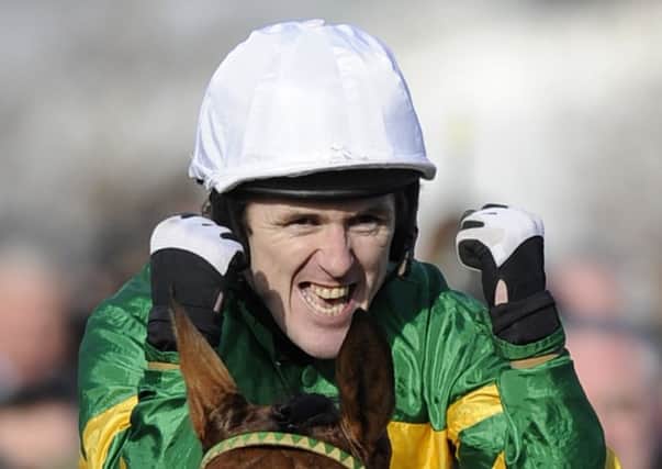 Tony McCoy celebrates on Binocular in the Champion Hurdle, 2010. Picture: Getty