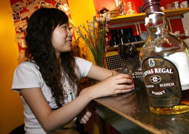 Hospitality workers in China are being taught the tricks of the whisky trade as popularity of the drink soars in Asia. Picture: Getty