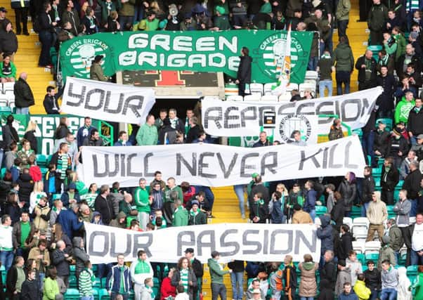 The Green Brigade with one of their banners. Their display at Celtic's game with Milan could land the club in trouble. File photo: TSPL