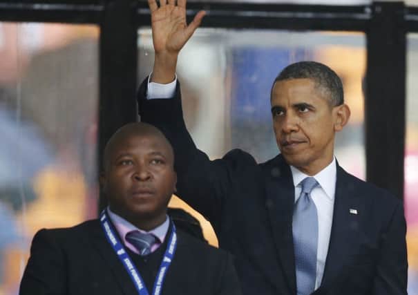 The 'interpreter' alongside US President Barack Obama. Picture: AP