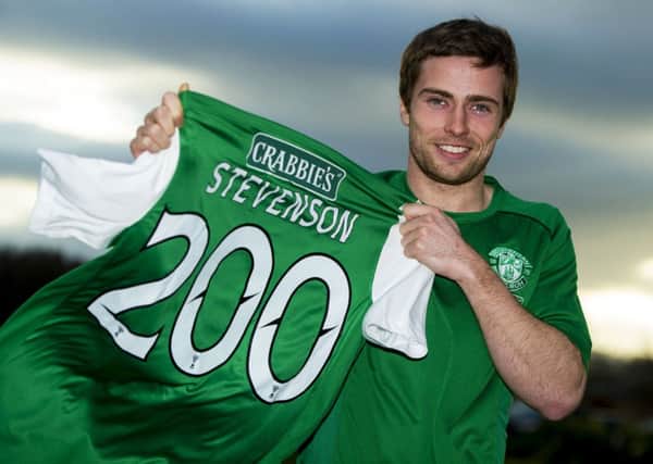 All smiles from Lewis Stevenson as he celebrates 200 Hibs games and targets more goals. Picture: SNS