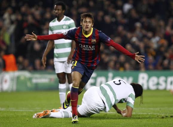 Hattrick hero Neymar wheels away in delight at the Nou Camp last night. Picture: Getty
