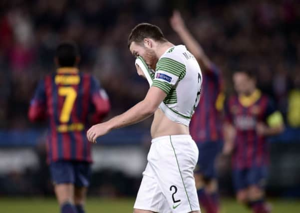 Celtic's Adam Matthews hides his face during last night's game. Picture: AP