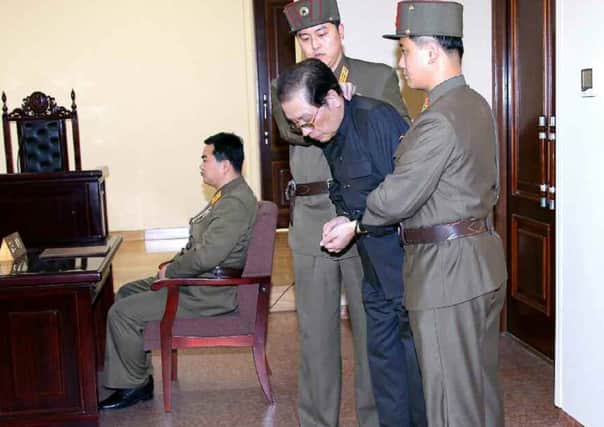 Jang Song-thaek, second from right, being escorted in court on 12 December. Picture: Getty