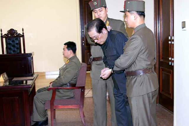 Jang Song-thaek, second from right, being escorted in court on 12 December. Picture: Getty