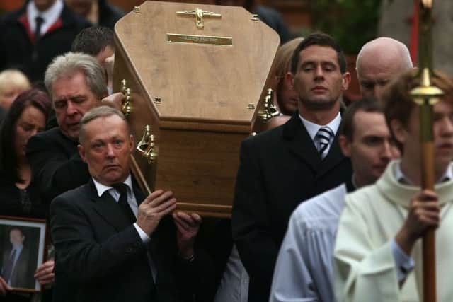 The coffin of Samuel McGhee is carried to St Margaret Mary's Church in Glasgow. Picture: PA