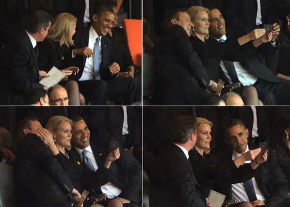David Cameron, Helle Thorning-Schmidt and Barack Obama pose for a photo. Picture: AFP/Getty