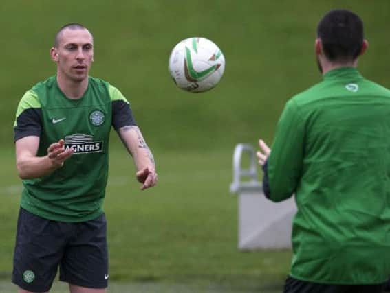 Captain Scott Brown is put through his paces in training yesterday. Picture: SNS