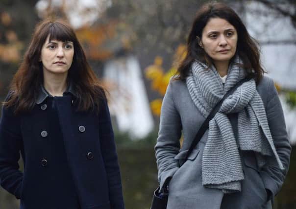 Francesca, left, and Elisabetta Grillo arrive at Isleworth Crown Court in west London. Picture: PA